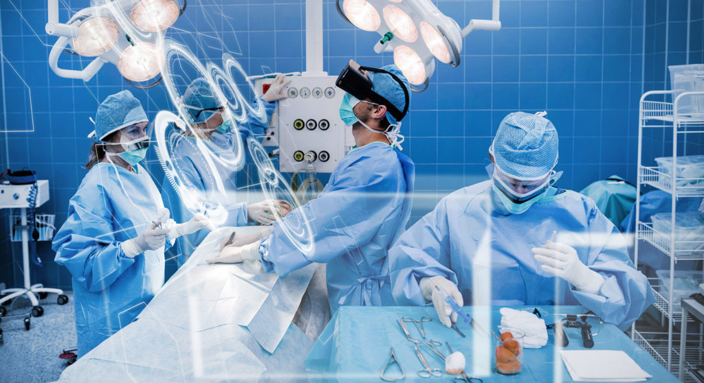 Surgeon with a virtual reality headset operating surgery on a patient