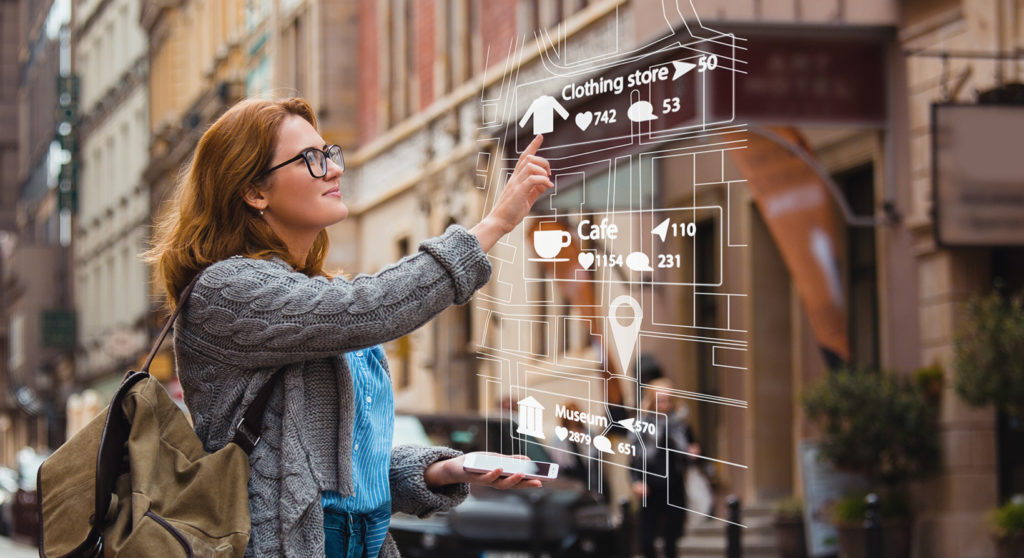 woman navigating on phone using augmented reality selecting clothing store