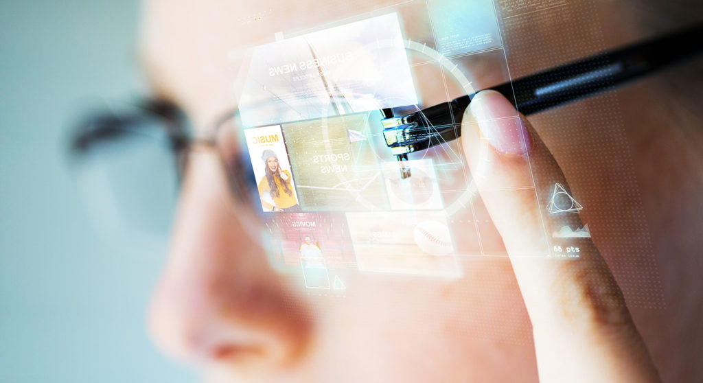 close up of woman in glasses with virtual screen